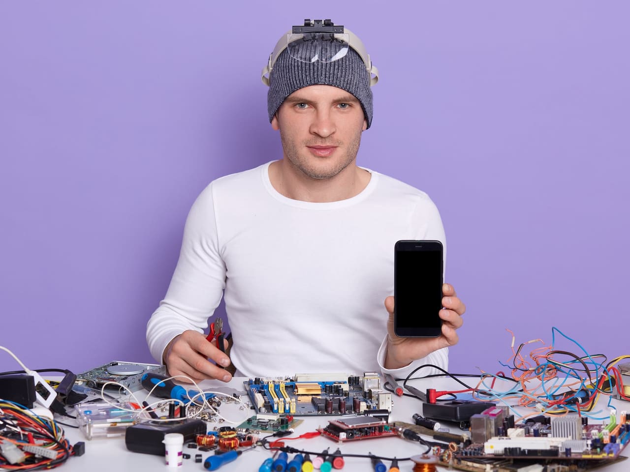 A repair technician at his workbench